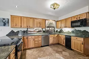 8281 Grizzly Way, Evergreen, CO 80439 - Photo 11