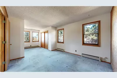 6755 Marshmerry Lane, Evergreen, CO 80439 - Photo 13