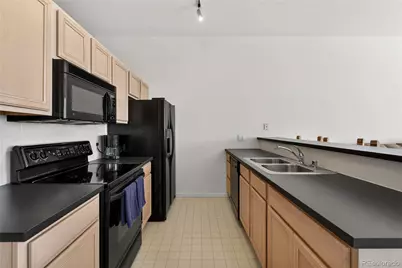 15475 Andrews Drive #406, Denver, CO 80239 - Photo 3