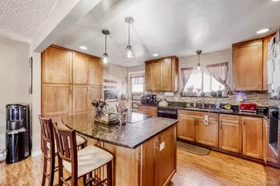 10940 Dahlia Way, Thornton, CO 80233 - Photo 5