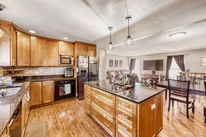 10940 Dahlia Way, Thornton, CO 80233 - Photo 7