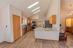 56100 E 33rd Ct, Strasburg, CO 80136 - Photo 5