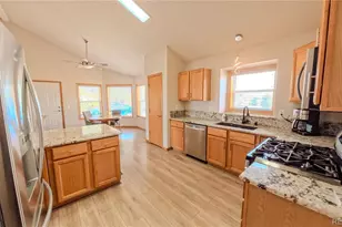 56100 E 33rd Ct, Strasburg, CO 80136 - Photo 3