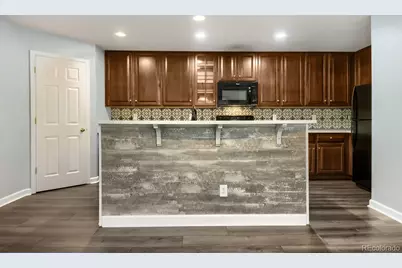 11833 Oak Hill Way #D, Commerce City, CO 80640 - Photo 3