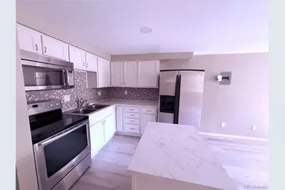 8828 E Florida Avenue #113, Denver, CO 80247 - Photo 1