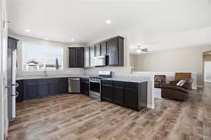 56499 E 23rd Pl, Strasburg, CO 80136 - Photo 15
