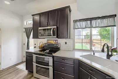 10035 Yampa Court, Commerce City, CO 80022 - Photo 9