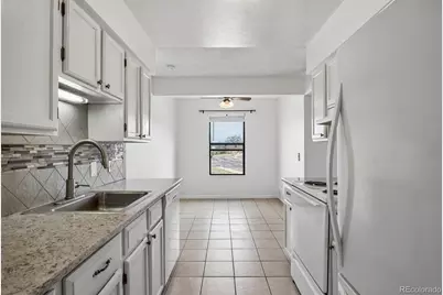 3121 S Tamarac Drive #208H, Denver, CO 80231 - Photo 11