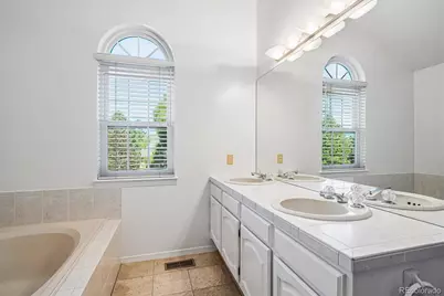 7454 Tenby Court, Castle Pines, CO 80108 - Photo 21