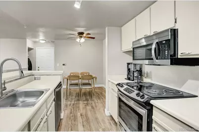 4760 S Wadsworth Boulevard #E204, Littleton, CO 80123 - Photo 3