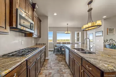 45425 Wolf Creek Drive, Bennett, CO 80102 - Photo 13