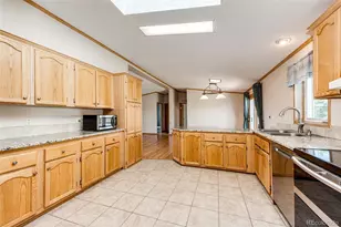 56054 E Virginia Pl, Strasburg, CO 80136 - Photo 13