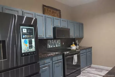 15475 Andrews Drive #304, Denver, CO 80239 - Photo 11