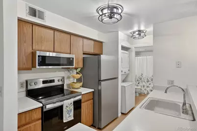 2575 S Syracuse Way #E207, Denver, CO 80231 - Photo 1