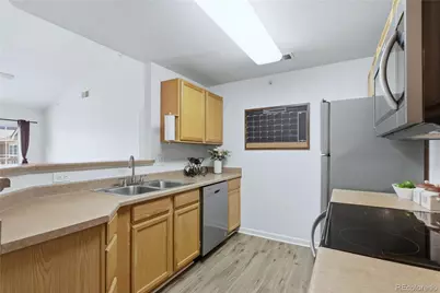 7440 S Blackhawk Street #14-305, Englewood, CO 80112 - Photo 11