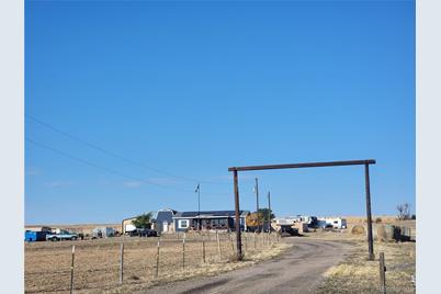 6255 Wolf Creek Road, Strasburg, CO 80136 - Photo 1