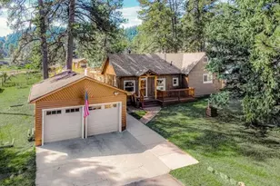 23039 Isoleta Rd, Indian Hills, CO 80454 - Photo 1