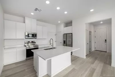 6153 N Ceylon Street #108, Denver, CO 80249 - Photo 1