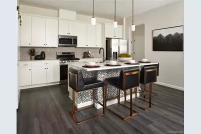 6153 N Ceylon Street #104, Denver, CO 80249 - Photo 1