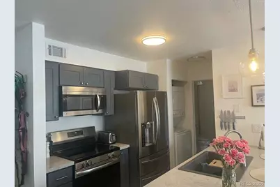 2575 S Syracuse Way #D103, Denver, CO 80231 - Photo 1