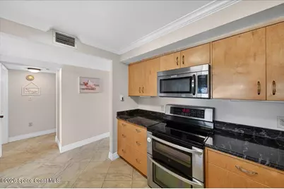 1525 Minutemen Causeway #105, Cocoa Beach, FL 32931 - Photo 11