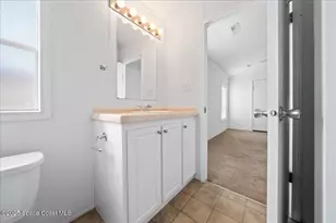 641 Hyacinth Cir, Barefoot Bay, FL 32976 - Photo 11