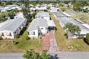 641 Hyacinth Cir, Barefoot Bay, FL 32976 - Photo 27