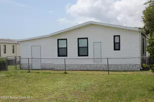 449 Dolphin Cir, Barefoot Bay, FL 32976 - Photo 19