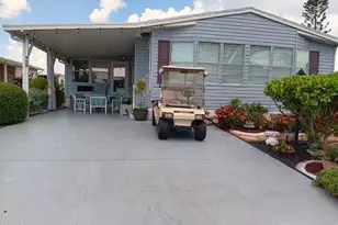 959 Frangi Pani Dr W, Barefoot Bay, FL 32976 - Photo 1