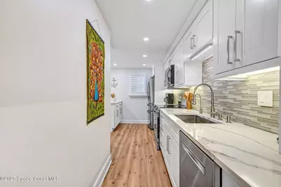 500 Palm Springs Boulevard #408, Indian Harbour Beach, FL 32937 - Photo 11