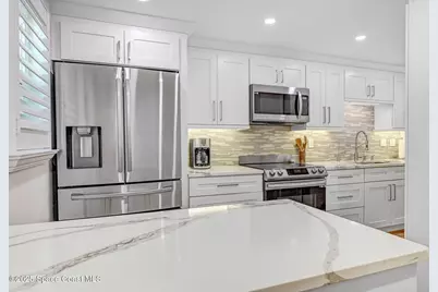 500 Palm Springs Boulevard #408, Indian Harbour Beach, FL 32937 - Photo 5