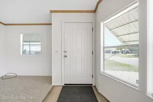 1229 Calusa Dr, Barefoot Bay, FL 32976 - Photo 9