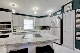 1109 Tequesta Dr, Barefoot Bay, FL 32976 - Photo 7