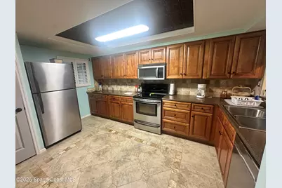 2467 S Washington Avenue #B111, Titusville, FL 32780 - Photo 5