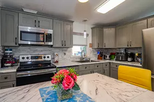 409 Avocado Dr, Barefoot Bay, FL 32976 - Photo 7