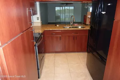 3165 N Atlantic Avenue #A203, Cocoa Beach, FL 32931 - Photo 7