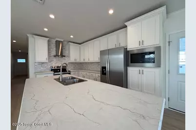 723 Hyacinth Circle, Barefoot Bay, FL 32976 - Photo 11