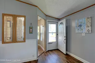 561 Dolphin Cir, Barefoot Bay, FL 32976 - Photo 7