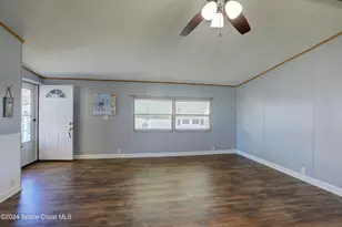 561 Dolphin Cir, Barefoot Bay, FL 32976 - Photo 11