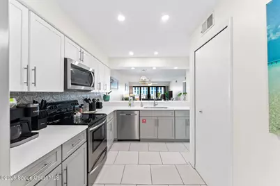 1050 N Atlantic Avenue #402, Cocoa Beach, FL 32931 - Photo 9