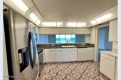 3740 Ocean Beach Boulevard #305, Cocoa Beach, FL 32931 - Photo 7