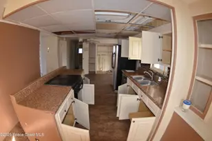 1056 Wren Cir, Barefoot Bay, FL 32976 - Photo 13