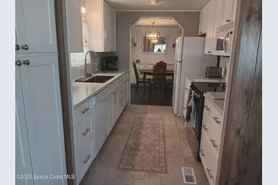 621 Hyacinth Circle E, Barefoot Bay, FL 32976 - Photo 5