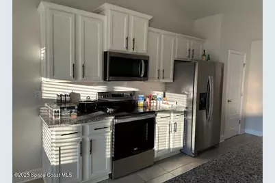 208 Lagoon Mist Court, Oak Hill, FL 32759 - Photo 11