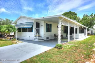 714 Amaryllis Dr, Barefoot Bay, FL 32976 - Photo 1