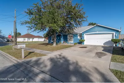 1045 Lundy Drive, Titusville, FL 32796 - Photo 3