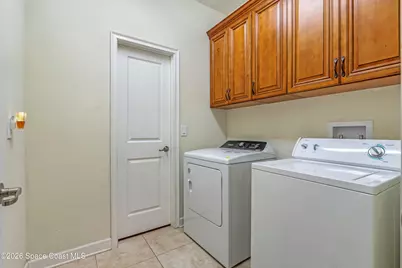 9923 Magnolia Woods Boulevard, Orlando, FL 32832 - Photo 23