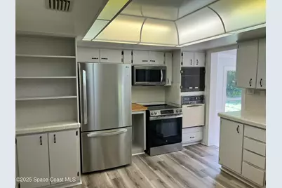 6031 Barna Avenue, Titusville, FL 32780 - Photo 13