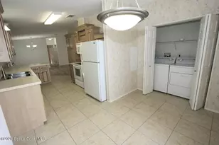 318 Macadamia Dr, Barefoot Bay, FL 32976 - Photo 7