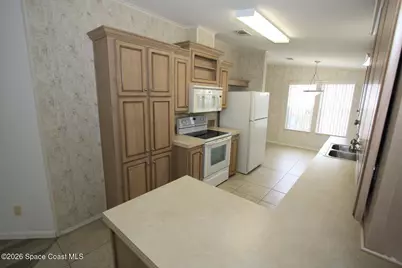 318 Macadamia Drive, Barefoot Bay, FL 32976 - Photo 9